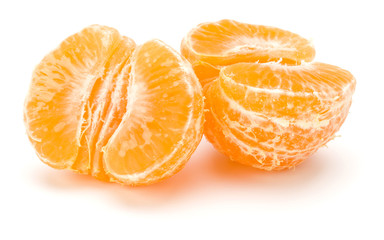 Peeled tangerine or mandarin fruit half  .