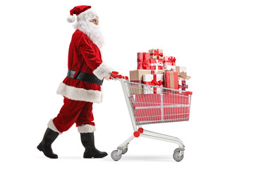 Santa Claus pushing a cart full of presents