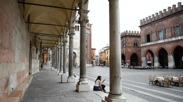 Cremona, Italy, view of the City Hall square from the arcade