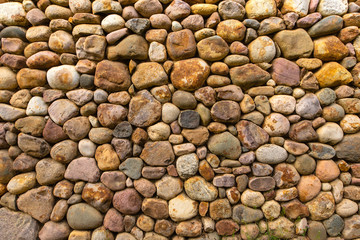 Textured stone wall bright multi-colored stones