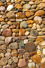 Textured stone wall bright multi-colored stones