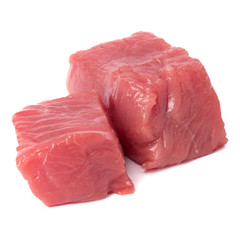 Raw chopped beef meat pieces isolated om white background cut out.