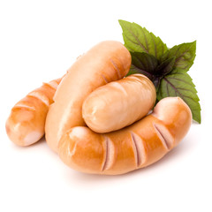 Roasted smoked sausages isolated on white background cutout