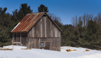 Wooden barn in winter