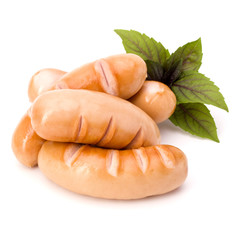 Roasted smoked sausages isolated on white background cutout