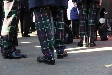 Scottish Men Wearing Tartan Trousers 