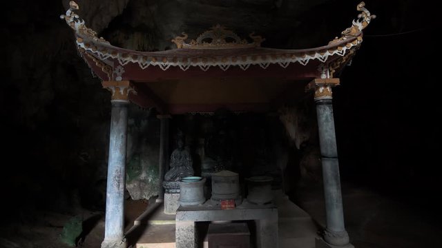 A small shrine inside a cave at Bich Dong Pagoda, Tam Coc, Vietnam