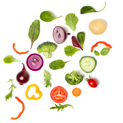 Creative layout made of tomato slice, onion, cucumber, basil leaves. Flat lay, top view. Vegetables isolated on white background. Food ingredient pattern.