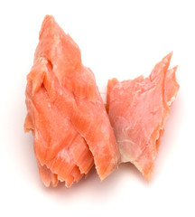 smoked salmon segments isolated on white background cutout. Prepared fish fillet fibres.