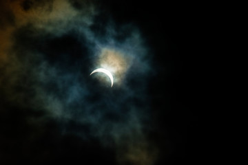Obraz na płótnie Canvas solar eclipse with clouds