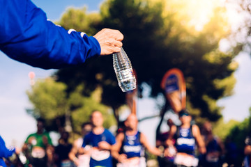Drinking water is important when we exercise like running to avoid becoming dehydrated.