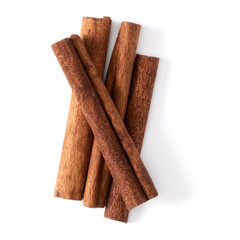 Cinnamon sticks isolated on white background closeup. Canella spice. Aromatic condiment background....