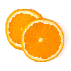 Orange fruit slice layout isolated on white background closeup. Food background. Flat lay, top view.