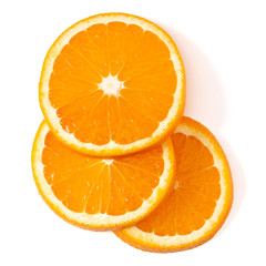 Orange fruit slice layout isolated on white background closeup. Food background. Flat lay, top view.