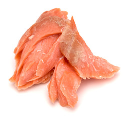 smoked salmon segments isolated on white background cutout. Prepared fish fillet fibres.