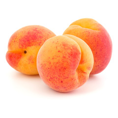 three apricot fruit isolated on white background cutout