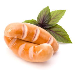 Two grilled sausages isolated on white background cutout