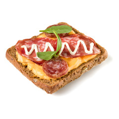 Canape with salami. Open faced sandwich crostini isolated on white background closeup. Appetizer tartarine.