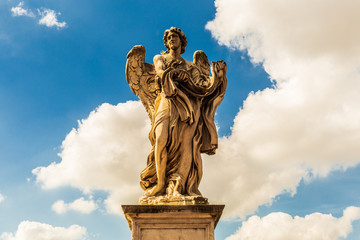 Angel with the Garment and Dice in Ponte Sant'Angelo (Rome, Italy)
