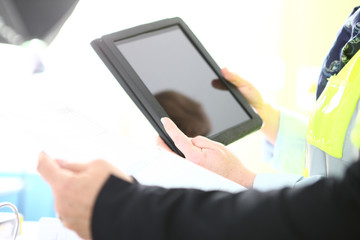 people at work with a table and papers