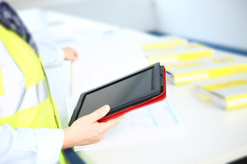 people at work with a table and papers