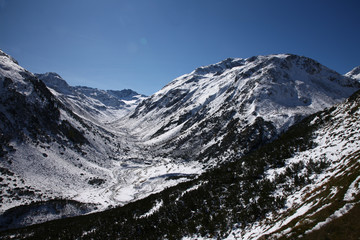 St. Moritz, Switzerand with lake and snowy mountains