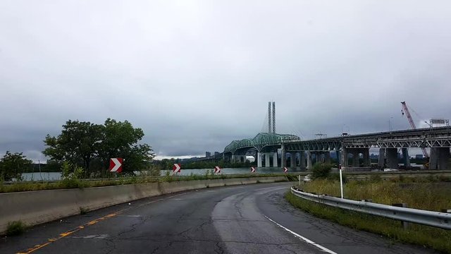 A view of  Samuel-De Champlain Bridge, Brossard, QC, Canada from inside of a moving vehicle.A motion footage.