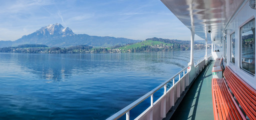 The outside deck of a ferry on lake Lucerne.