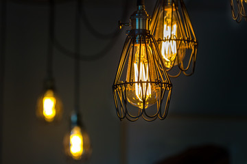 Fototapeta na wymiar Vintage led filament light bulbs hanging, indoors.