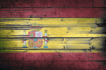 Spain national flag on wooden rustic background. Patriotism and world countries concept.