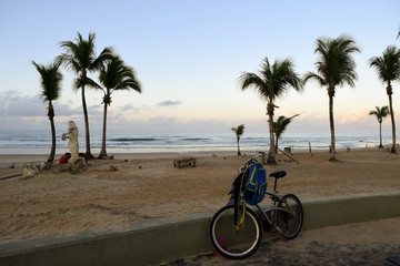 Deserted beach with parked bike