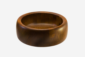 Salad bowl empty of solid white rubber oak teak wood laminated round with spoon ladle tong  stirrer fork isolated on white background.