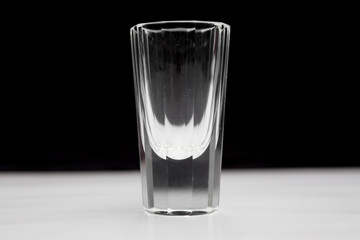  Shot glass  on white and black background