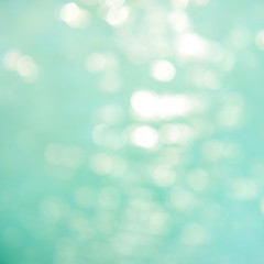 Obraz premium Soft focus bokeh light effects over a rippled