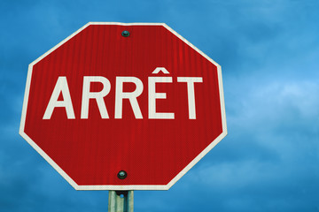 big stop sign quebec foreign language french culture road