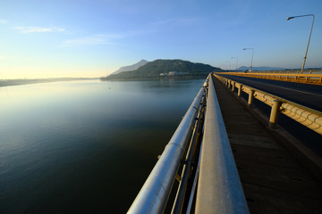 Obraz premium Bridge communication at Khong river builded in world war 2 nd in Peak-se of Laos.