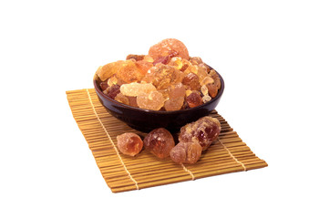 Arabic gum manna natural mana resin crystal, senegal acacia on table. Food from god heaven fall from sky. Nutritional edible aromatic health food from middle east.