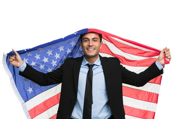 Caucasian businessman holding America flag..