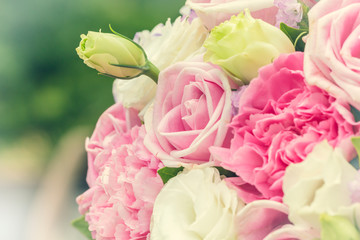 Colorful multiplicity roses background, shallow depth of field. retro vintage instagram filter for...