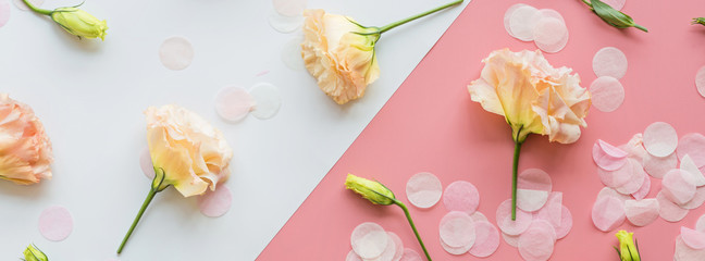 Flowers composition with confetti on pink background. Woman day, 8 march, Mother day, Birthday, Valentine Day background. Flat lay, top view, copy space. template, mockup. Holiday and beauty concept