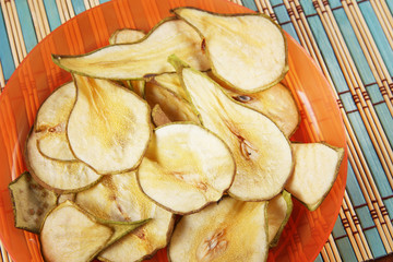 Healthy and tasty fruit chips produced from pears. Vegetarian dietary food