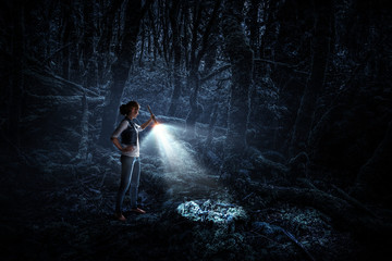 Fototapeta premium Make her way in darkness. Mixed media