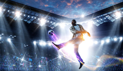 Soccer man in action with ball. Mixed media