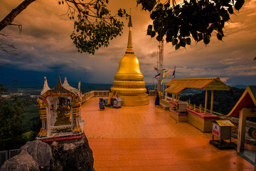 Wat Tham Seua Krabi-Krabi: 20 October 2019, atmosphere of a large Buddha statue on a high mountain,...