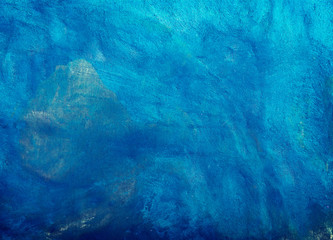 The background texture of the blue wall