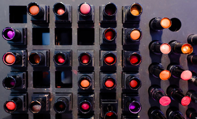 used Lipstick on display shelf, Cosmetics tester panel