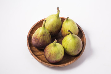 Fresh fig fruit half and quarter isolated