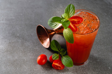 Bloody mary on stone background in gray color.