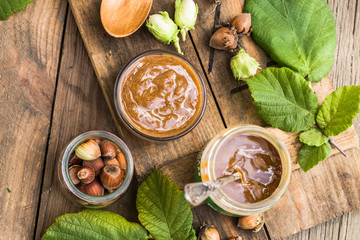 Homemade chocolate with hazelnut in a glass bowl with nuts, cocoa powder. The concept of confectionery and sweets for Breakfast.