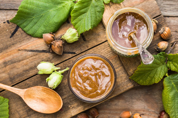 Homemade chocolate with hazelnut in a glass bowl with nuts, cocoa powder. The concept of confectionery and sweets for Breakfast.